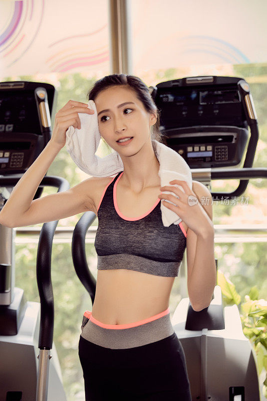 Fitness girl working out in a gym